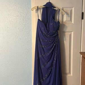 Size 12 Royal Blue, slightly purplish. Gorgeous dress
